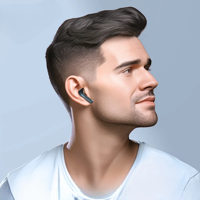 Man wearing a wireless earbud with a gray background