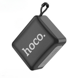 Black portable speaker with 'hoco' branding on a white background