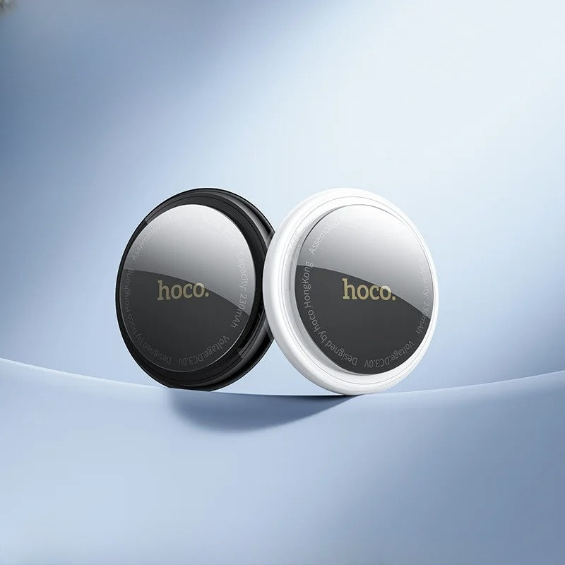 Two circular phone cases, one black and one white, with 'hoco.' branding on a light blue background.