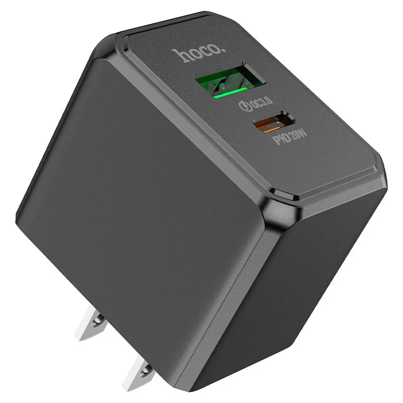 Black hoco wall charger with USB ports on a white background