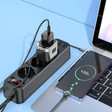 Multi-port charger with smartphone and laptop on a blue background