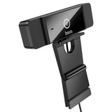 Black webcam with adjustable stand on a white background, featuring the brand 'hoco'.