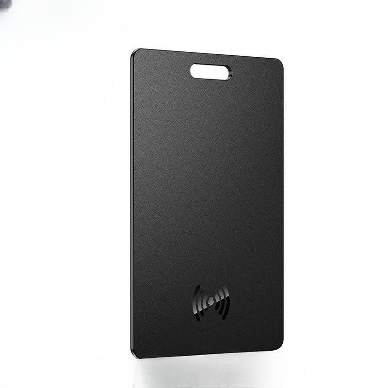 Black portable hard drive on a white background