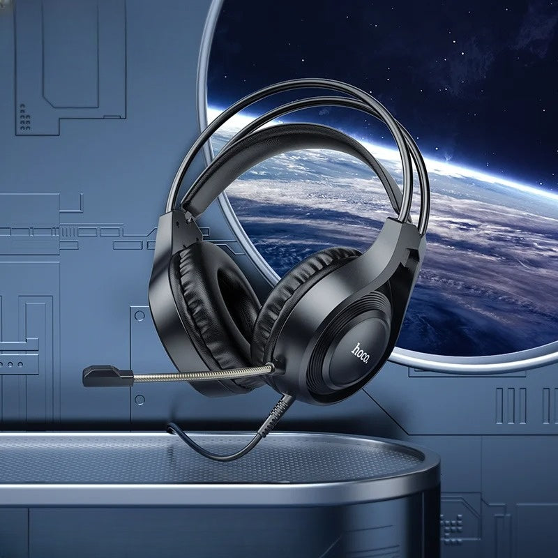 Headphones with a space-themed background featuring Earth