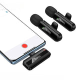 Black Hoco lavalier microphones with smartphone displaying recording app on a white background