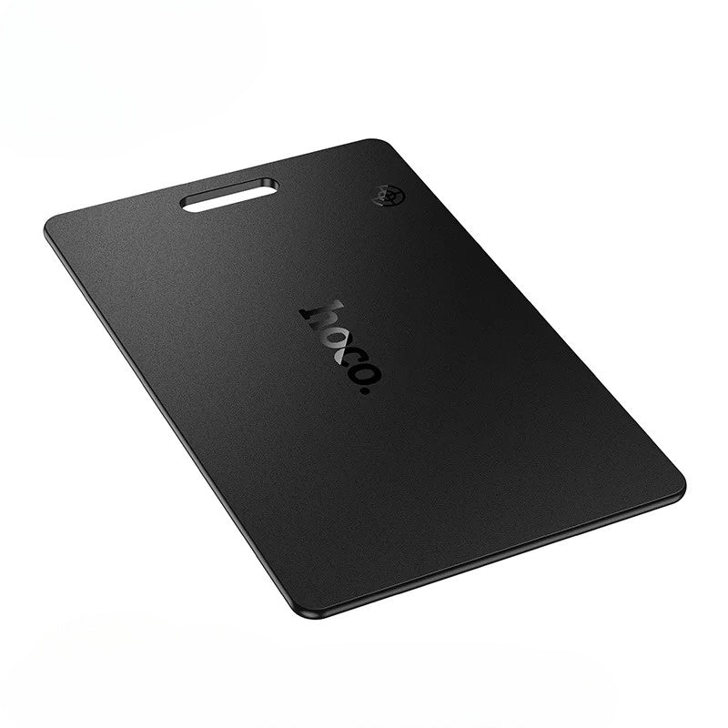 Black cutting board with 'hoco' branding on a white background