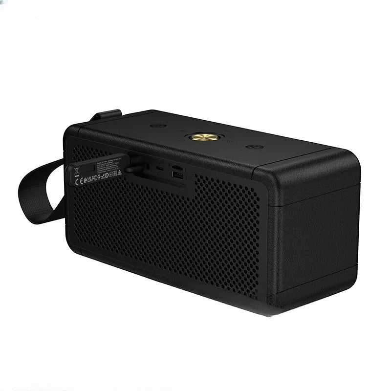 Black portable speaker with a strap on a white background